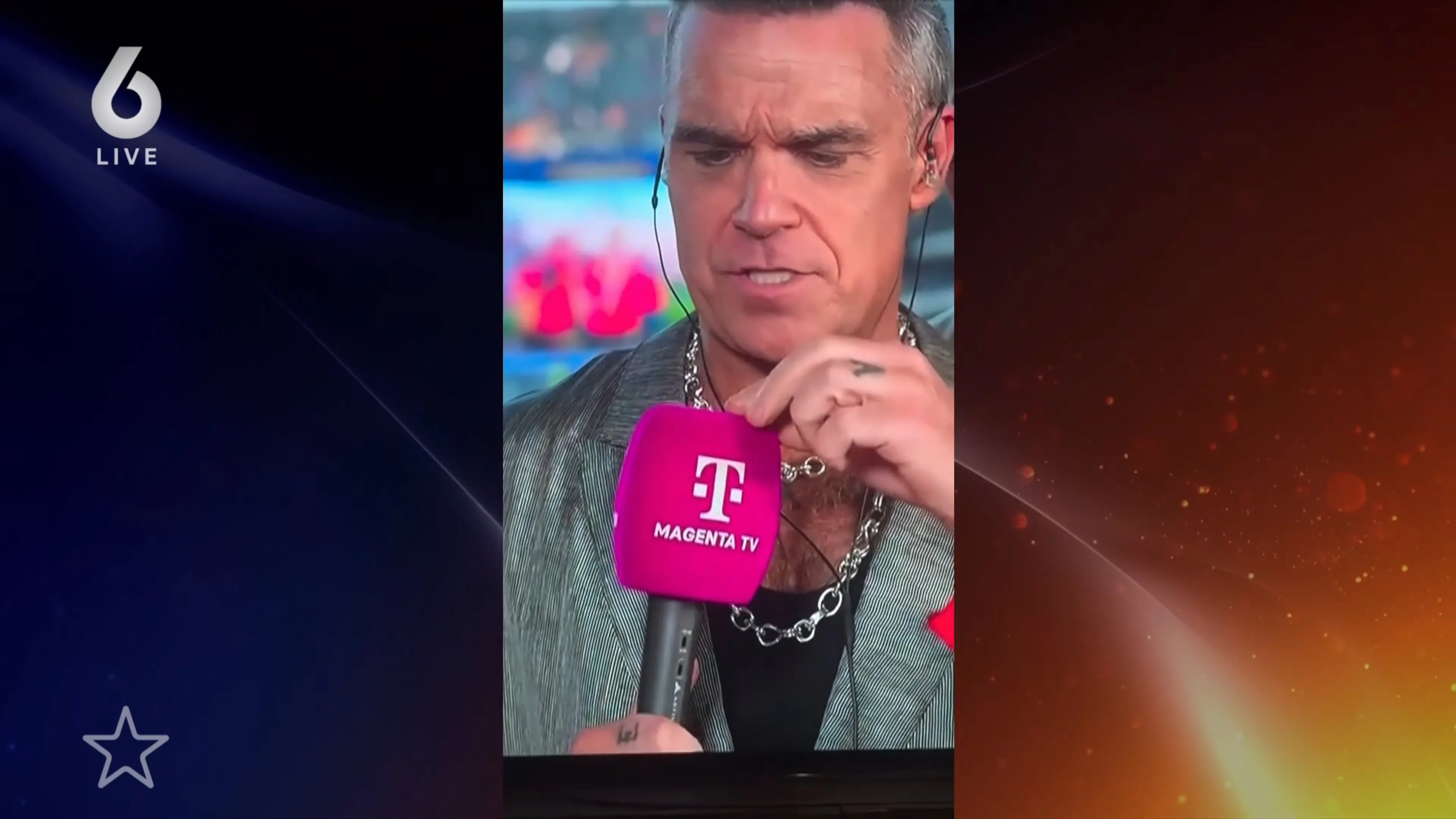 Robbie Williams reageert op geruchten dat er cocaïne uit zijn neus viel