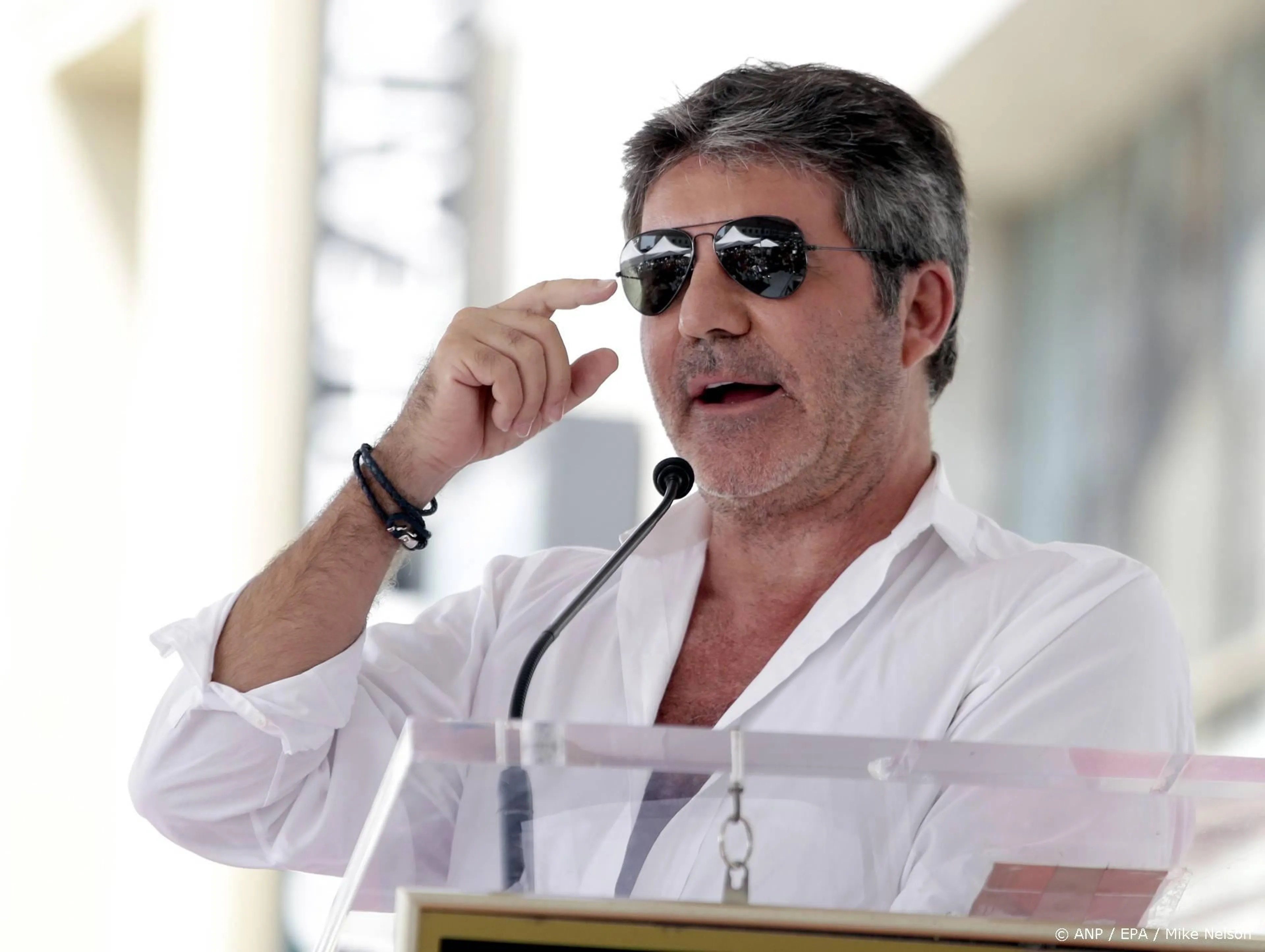 Simon Cowell aangeklaagd door voormalige adviseur