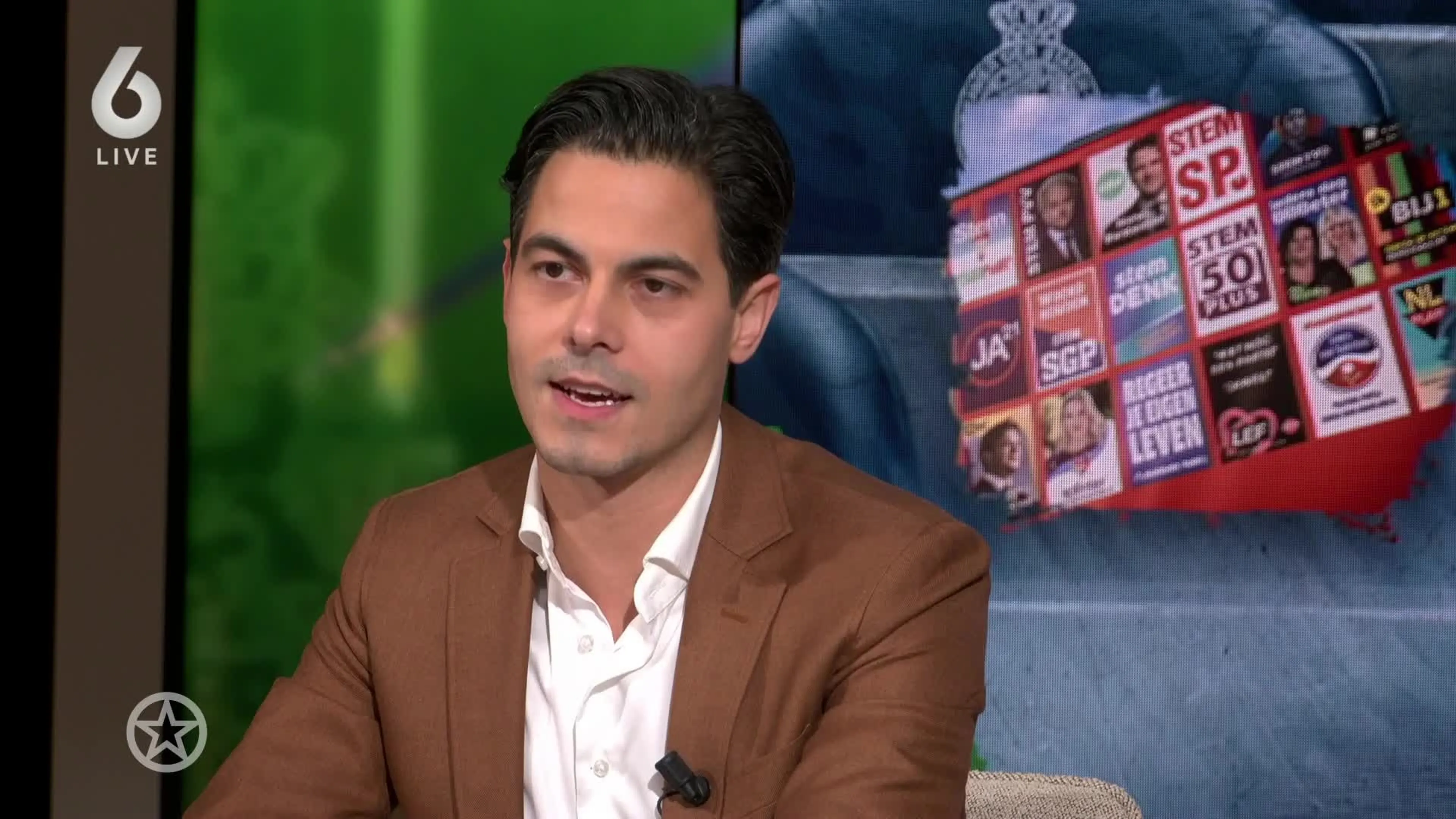 Rob Jetten samen met zijn 'hockeyhunk' op bezoek in Shownieuws
