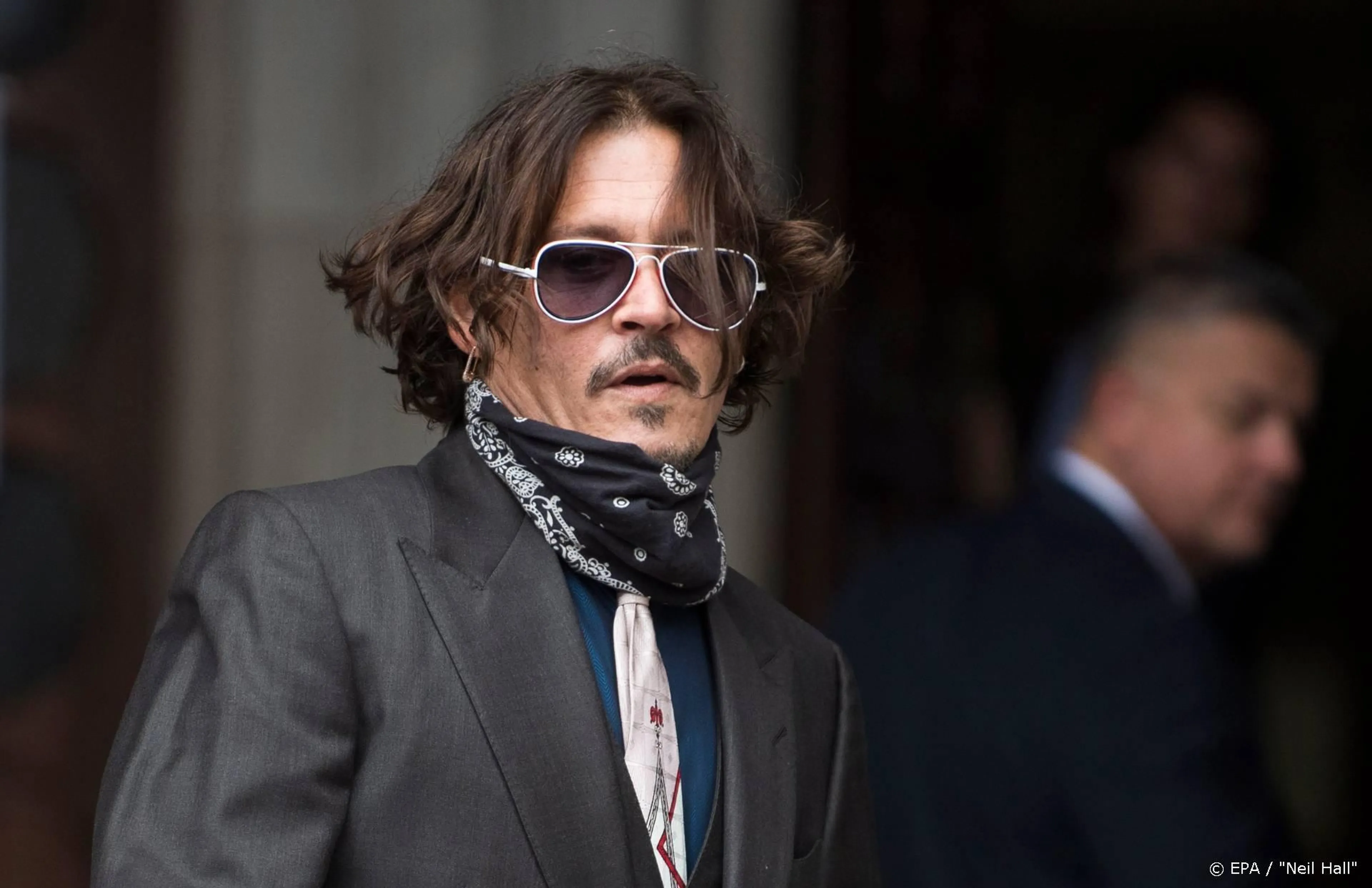Johnny Depp ontkent slaan Amber Heard na grap over tatoeage