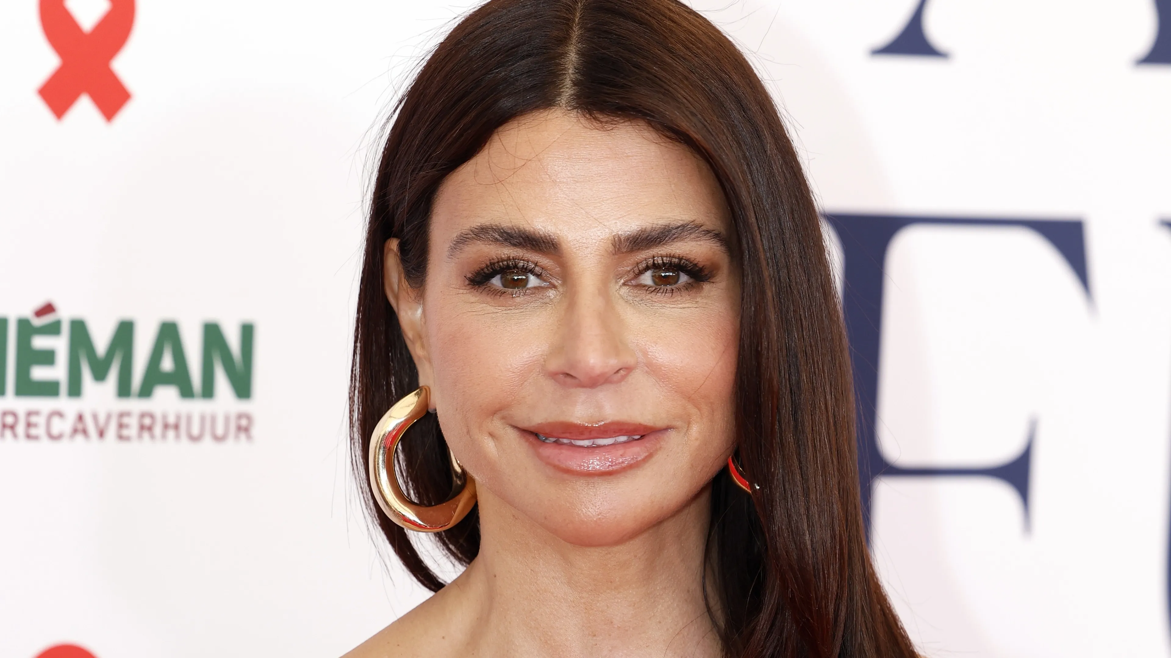 'Olcay Gulsen zoenend gespot met steenrijk Quote 500-lid'