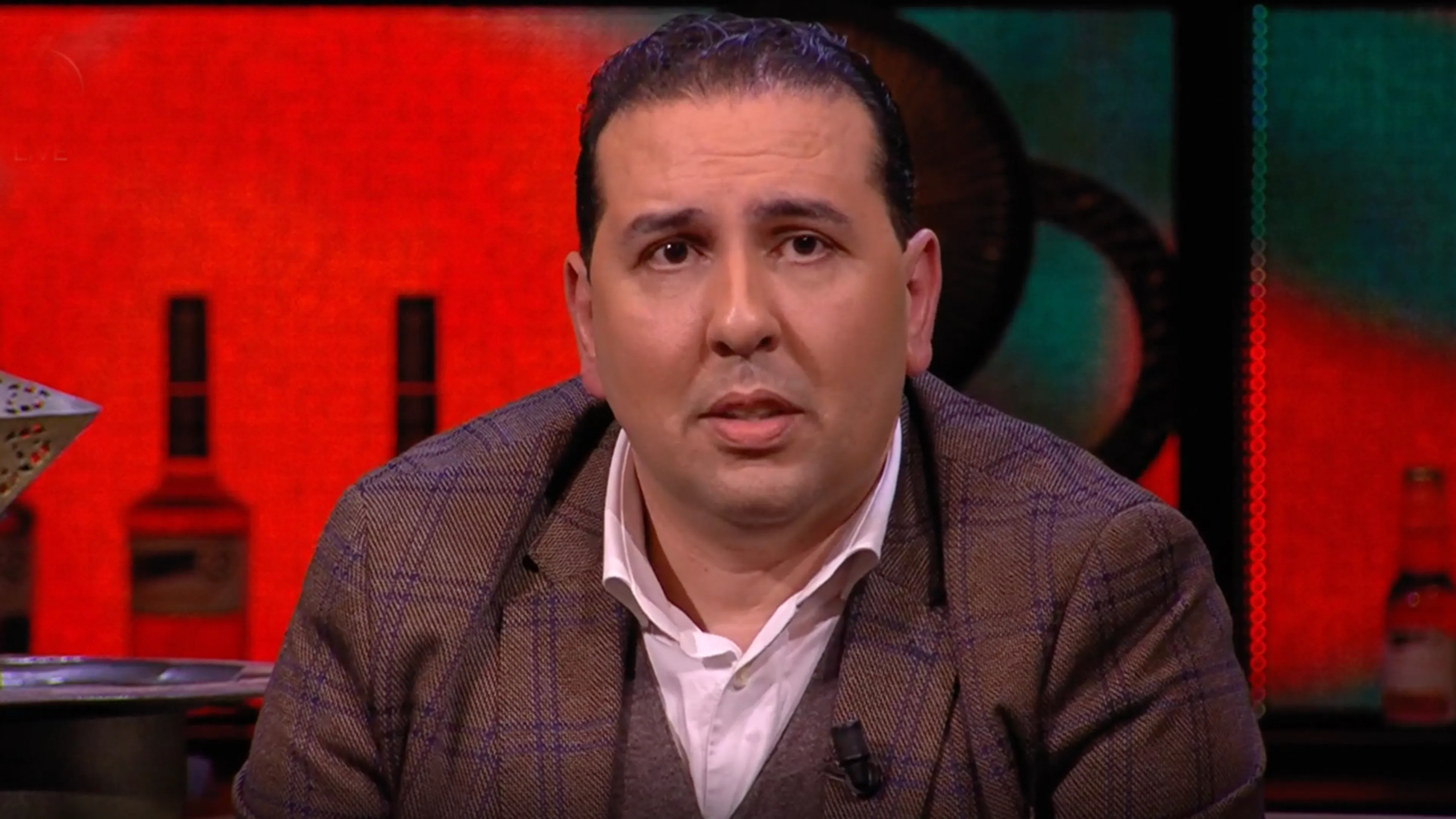 Mohammed Hamdi kijkt met afschuw naar rellende Marokko-fans: 'Waarom je eigen land slopen?'