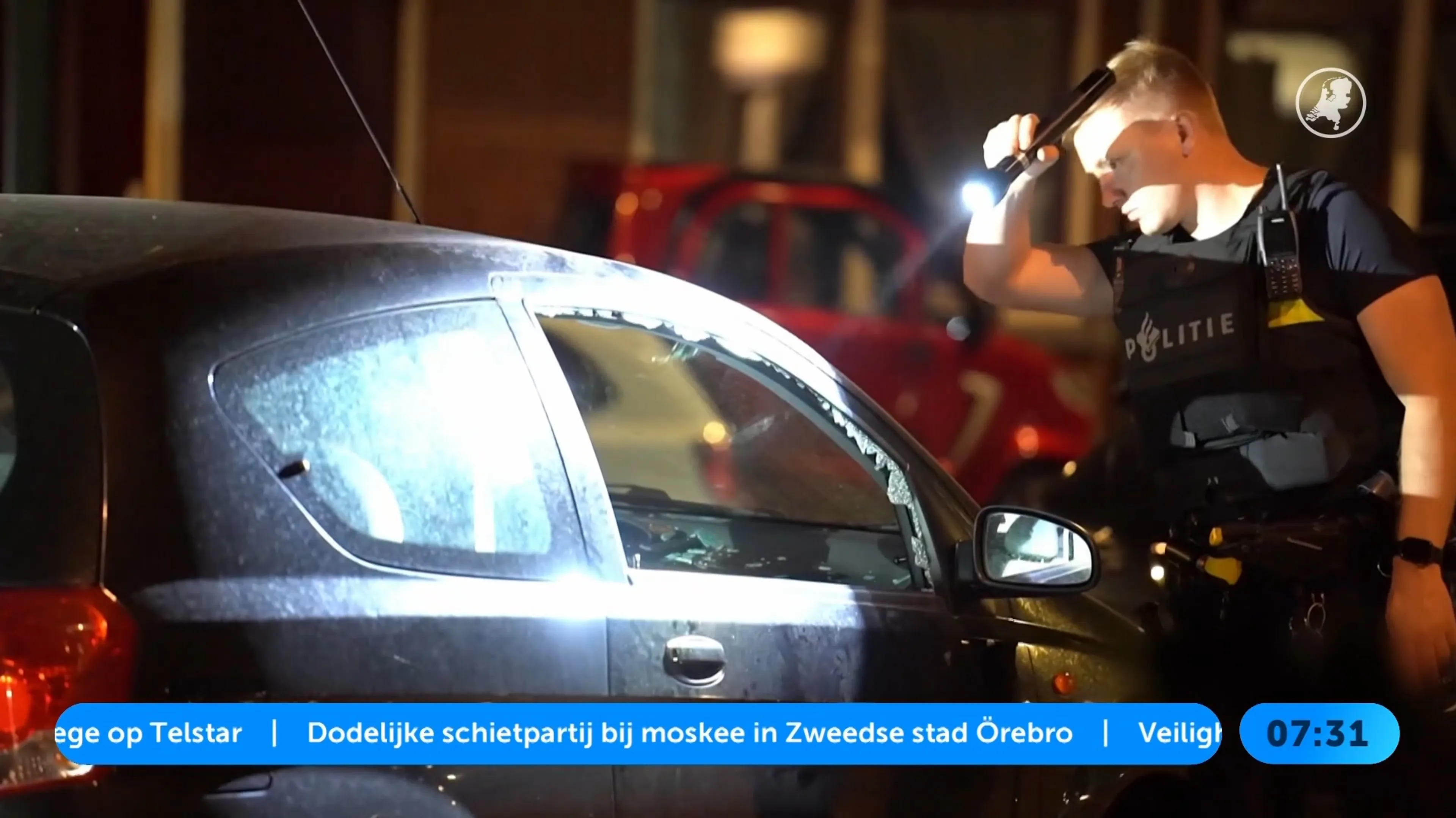Auto beschoten in Rotterdam, twee gewonden