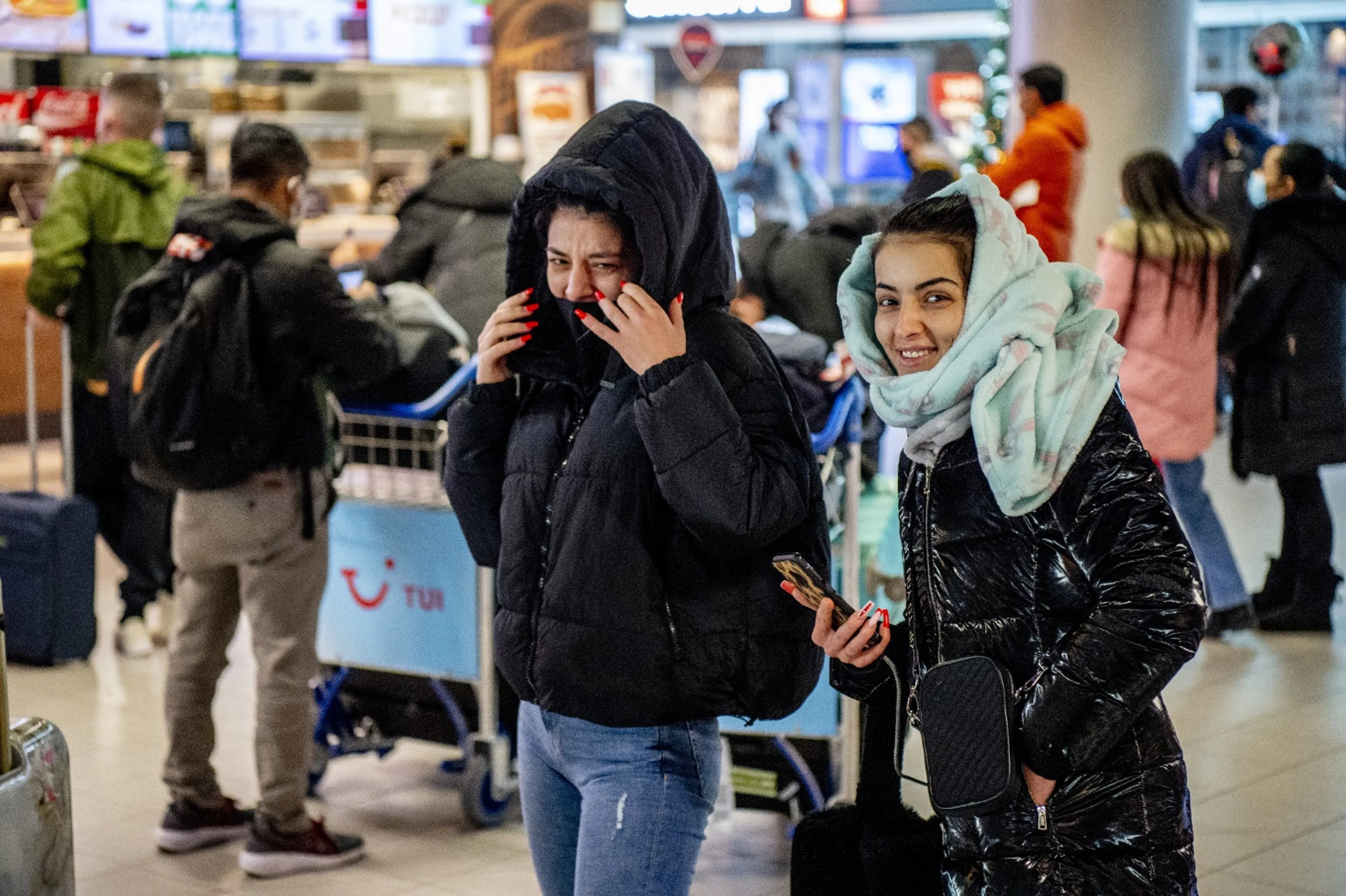 Koud onthaal op Schiphol: luchthaven zet verwarming graad lager