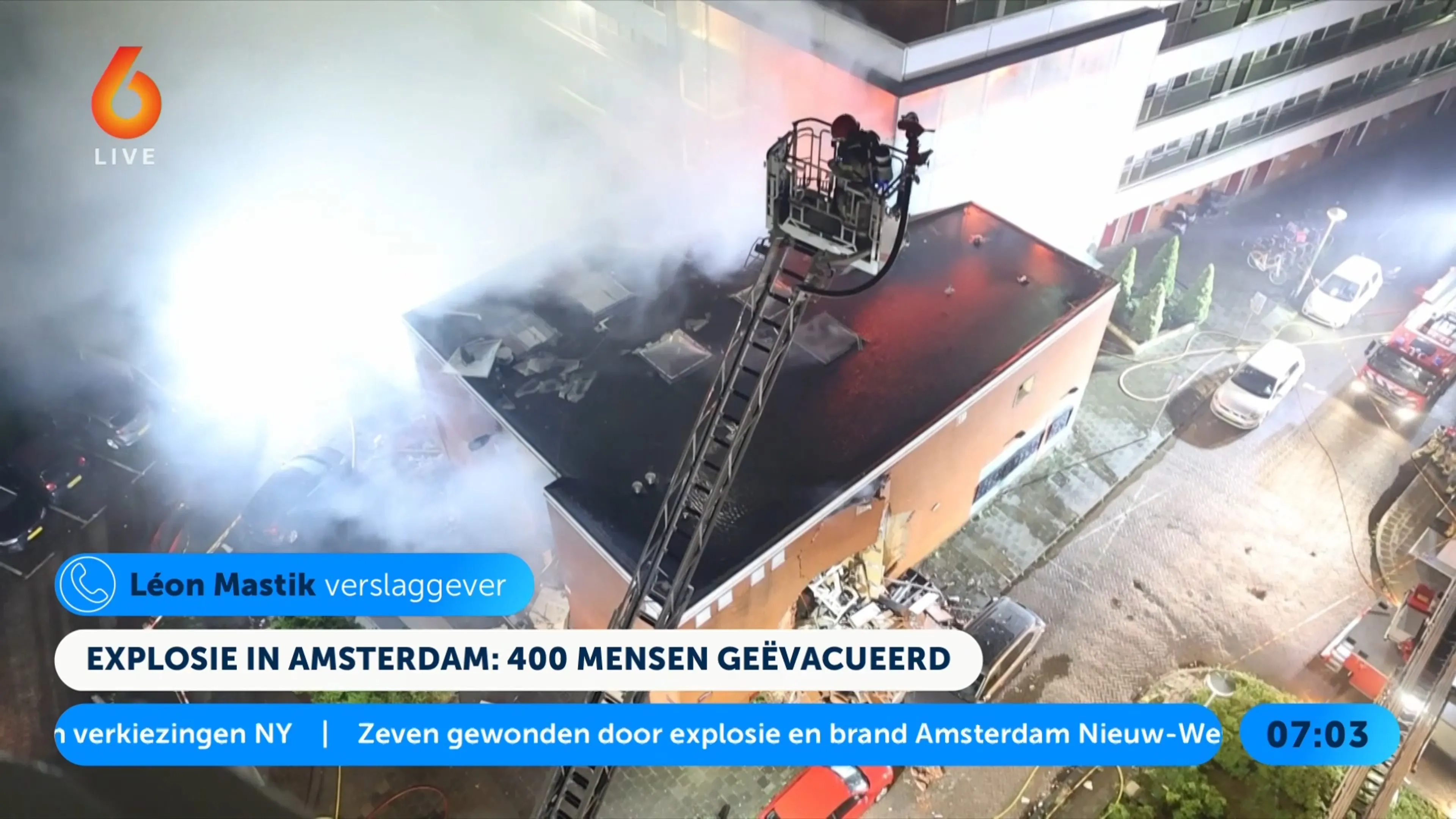 Explosie en brand bij flat in Amsterdam: grote schade en zoekactie