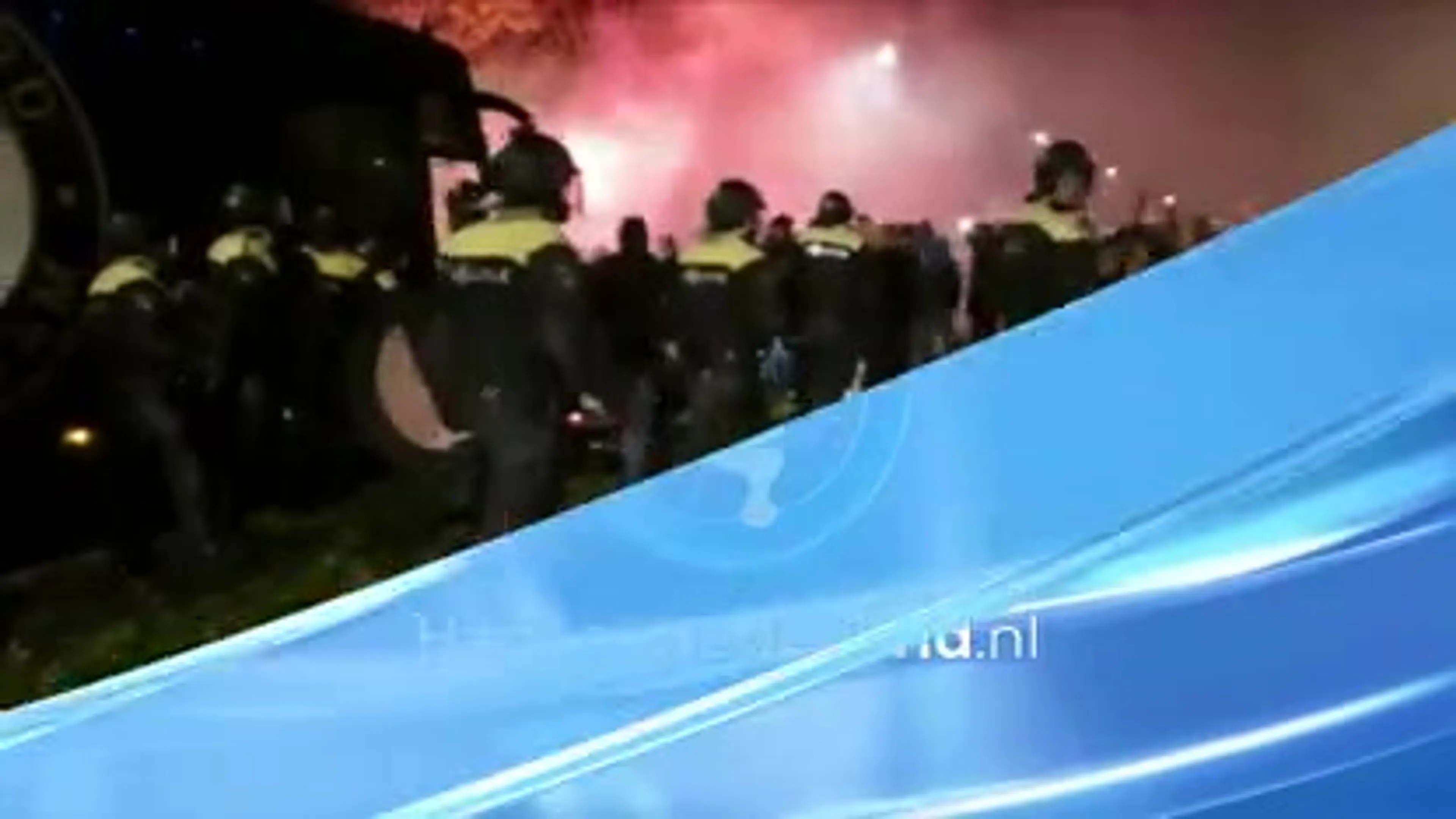 Boze Feyenoord-fans wachten spelersbus op: 'Weg met Stam!'