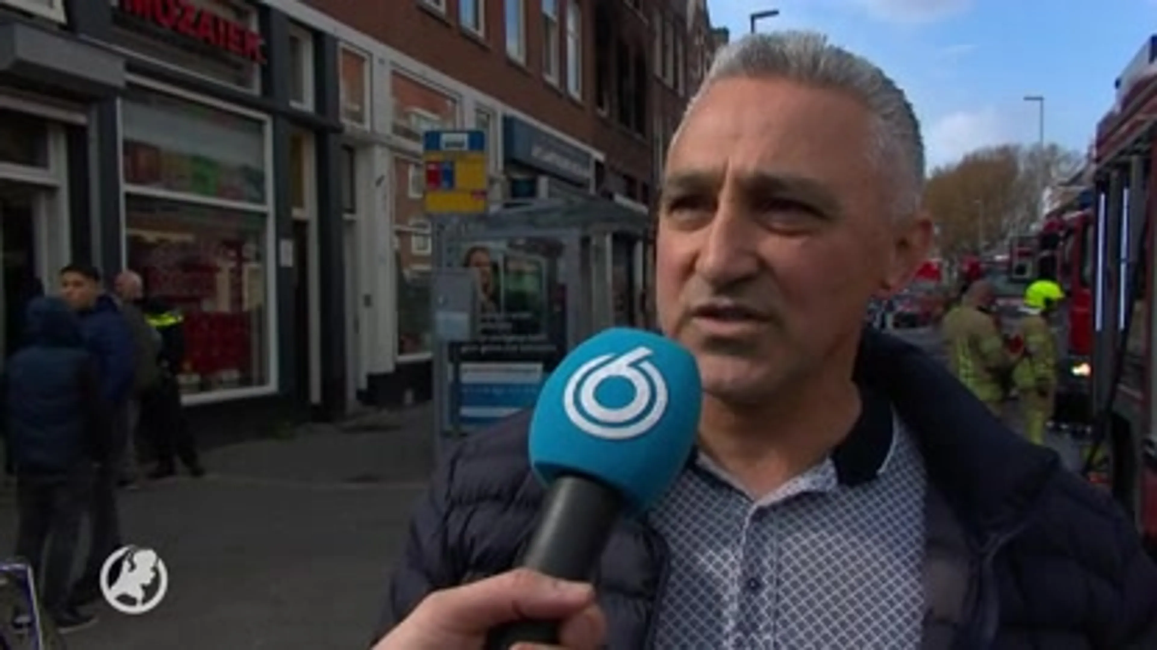Man overleden na sprong uit brandende Rotterdamse flat